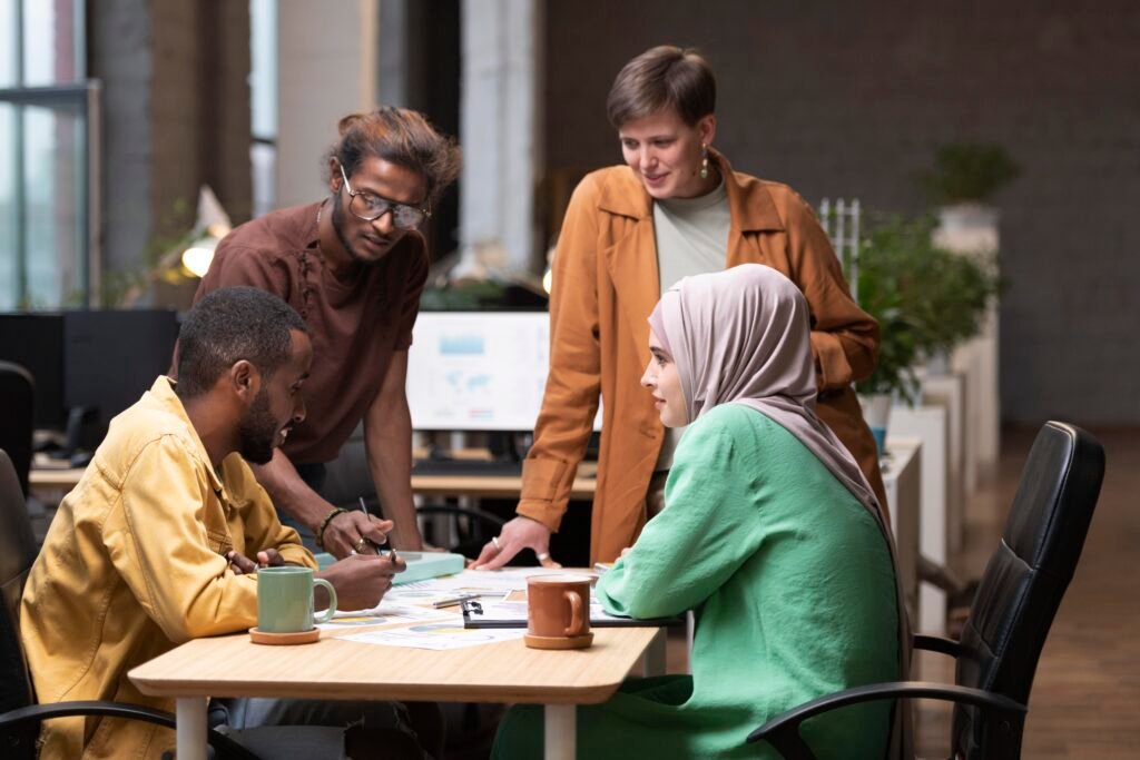 medium shot colleagues having meeting